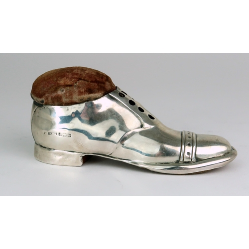 2470 - A GEORGE V NOVELTY SILVER PIN CUSHIONby S. Blanckensee & Son Ltd, modelled in the form of a shoe... 