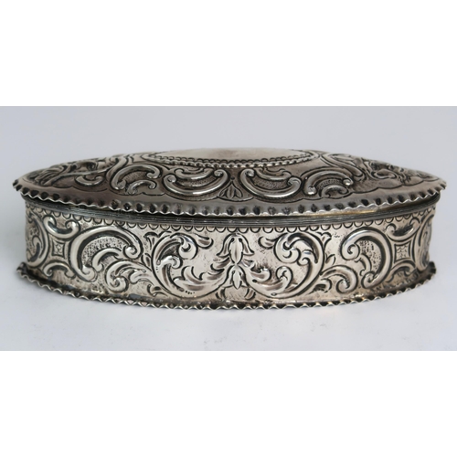 2472 - A VICTORIAN SILVER JEWELLERY BOXby Robert Humphries, London 1881, of oval form, with moulded scrolli... 