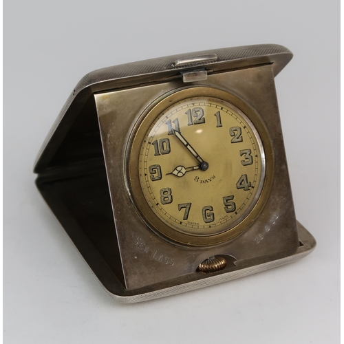 2479 - A GEORGE V SILVER MOUNTED TRAVELLING CLOCKthe case by William Base & Sons, Birmingham 1928, of c... 