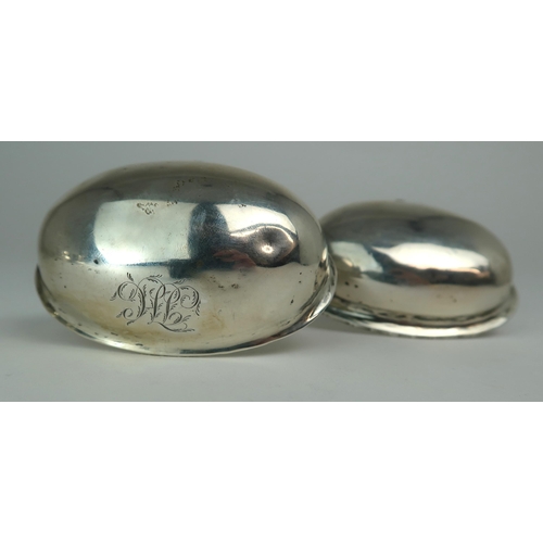 2481 - TWO GEORGIAN WHITE METAL TODDY LADLESboth with oval shaped bowls and turned whalebone handles, one m... 