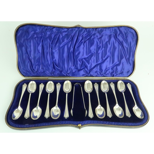 2493 - A CASED SET OF EDWARDIAN SILVER TEASPOONS AND SUGAR TONGSby John Round & Sons, Sheffield 1902, o... 