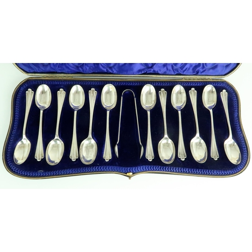 2493 - A CASED SET OF EDWARDIAN SILVER TEASPOONS AND SUGAR TONGSby John Round & Sons, Sheffield 1902, o... 