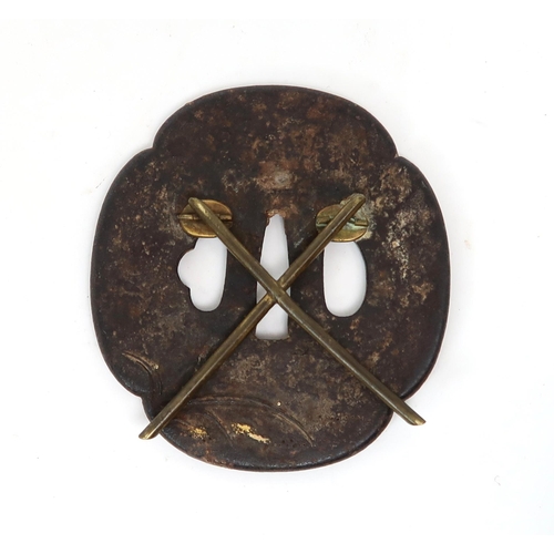 2613 - A JAPANESE GILT-BRONZE TSUBA, LIKELY 19TH CENTURYWell-patinated and of characteristic form, with cas... 