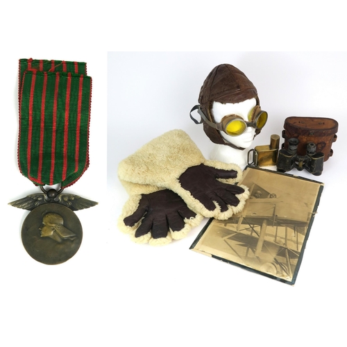 2618 - WW1-ERA FLYING APPAREL Comprising a pair of large sheepskin gauntlets, yellow-lensed goggles with sp... 