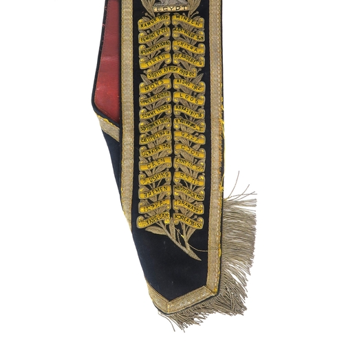 2621 - A 20th CENTURY KING'S OWN SCOTTISH BORDERERS DRUM MAJOR'S BALDRIC SASHOf black wool Melton cloth bac... 