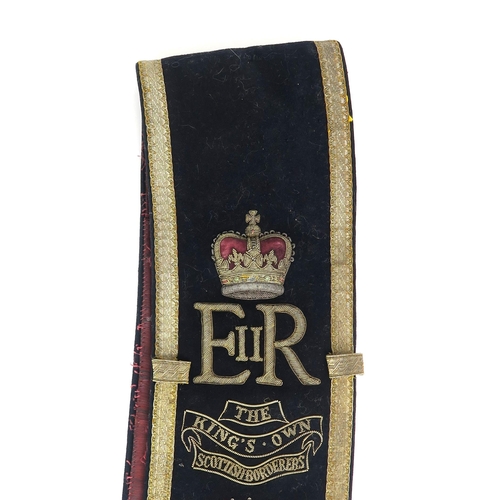 2621 - A 20th CENTURY KING'S OWN SCOTTISH BORDERERS DRUM MAJOR'S BALDRIC SASHOf black wool Melton cloth bac... 