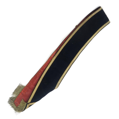 2621 - A 20th CENTURY KING'S OWN SCOTTISH BORDERERS DRUM MAJOR'S BALDRIC SASHOf black wool Melton cloth bac... 