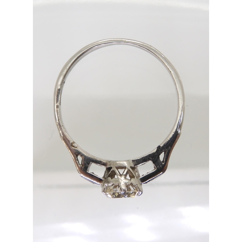 2703 - A CLASSIC VINTAGE DIAMOND RINGset with an estimated approx 0.58ct brilliant cut diamond, with furthe... 