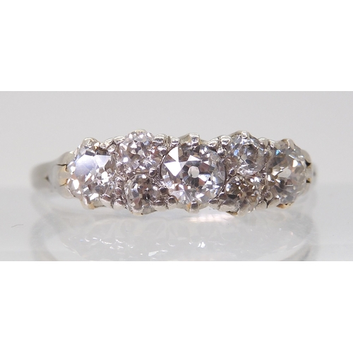 2704 - AN OLD CUT DIAMOND CLUSTER RINGmounted throughout in white metal and set with estimated approx 0.50c... 