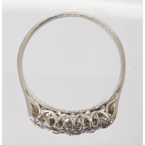 2704 - AN OLD CUT DIAMOND CLUSTER RINGmounted throughout in white metal and set with estimated approx 0.50c... 