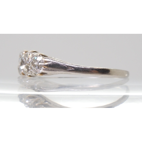 2704 - AN OLD CUT DIAMOND CLUSTER RINGmounted throughout in white metal and set with estimated approx 0.50c... 