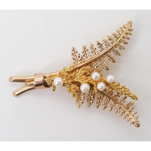 2706 - A 9CT GOLD FERN BROOCHset with five pearls, stamped with the makers mark A&W, dimensions 4.5cm x... 