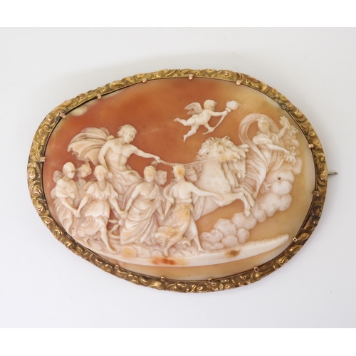 2715 - A LARGE CLASSICAL THEMED CAMEOthe well carved shell cameo depicting Apollo in his horse drawn chario... 