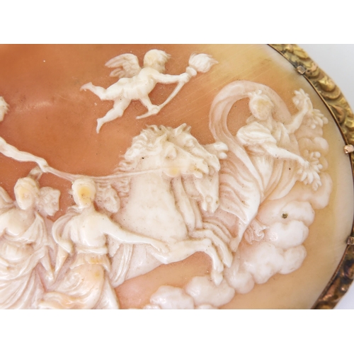 2715 - A LARGE CLASSICAL THEMED CAMEOthe well carved shell cameo depicting Apollo in his horse drawn chario... 