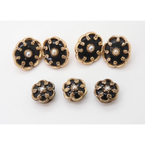 2722 - A VINTAGE SET OF CUFFLINKS AND STUDSmounted in yellow metal, set with black glass and pearls, in ori... 