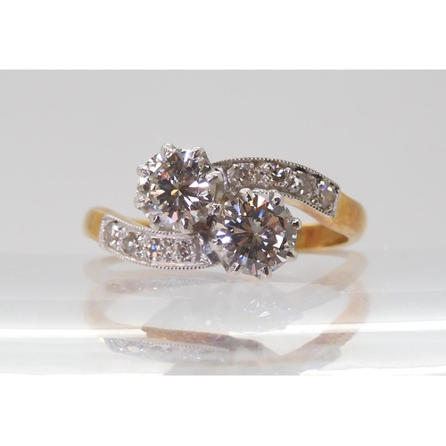 2723 - A CLASSIC TWIN STONE DIAMOND RINGmounted in 18ct yellow gold and platinum, set with estimated approx... 