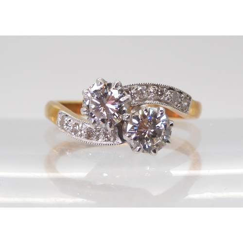 2723 - A CLASSIC TWIN STONE DIAMOND RINGmounted in 18ct yellow gold and platinum, set with estimated approx... 