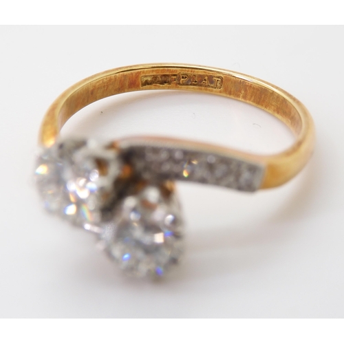 2723 - A CLASSIC TWIN STONE DIAMOND RINGmounted in 18ct yellow gold and platinum, set with estimated approx... 