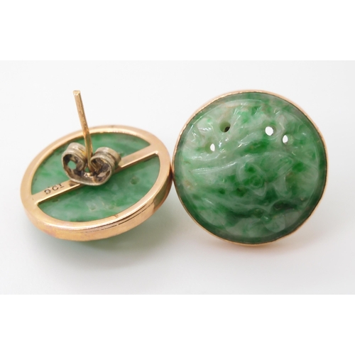 2734 - A PAIR OF CHINESE GREEN HARDSTONE EARRINGScarved with foliage and set in 9ct gold stud earring mount... 