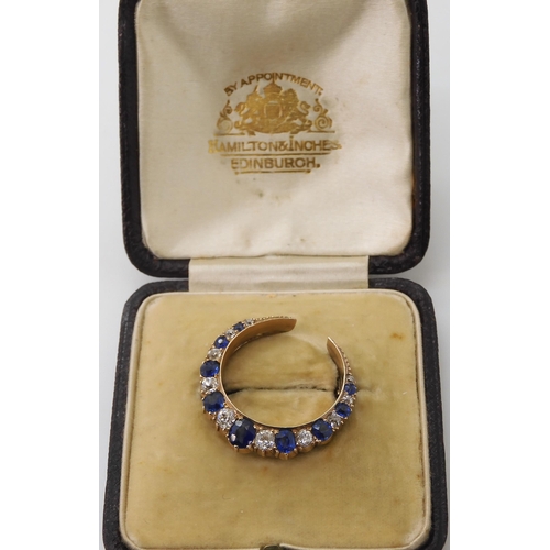 2735 - A SAPPHIRE & DIAMOND MOON BROOCHset throughout in yellow metal with galleried mount, in original... 