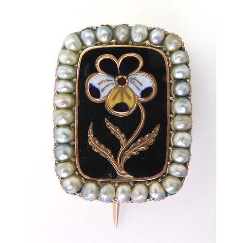 2741 - THREE JEWELSa pansy mourning brooch, with enamel and seed pearls, mounted in yellow metal, dimension... 