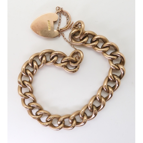 2742 - A 9CT GOLD CURB CHAIN BRACELETwith heart-shaped clasp, hollow construction with alternate links text... 