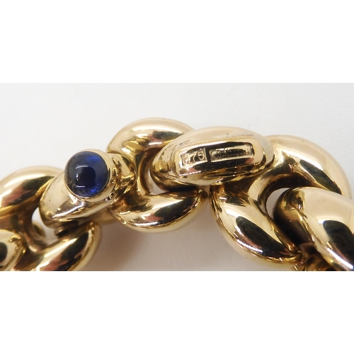 2751 - A 9CT GOLD CHIAMPESAN FANCY CHAINwith hollow puffed links, and a sapphire cabochon set to the clasp ... 