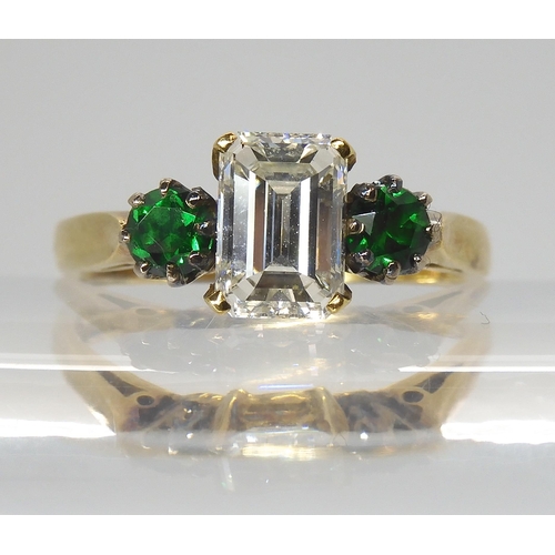 2753 - AN UNUSUAL DIAMOND AND DIOPSIDE RINGmounted in 18ct yellow gold with full hallmarks for London 1981.... 