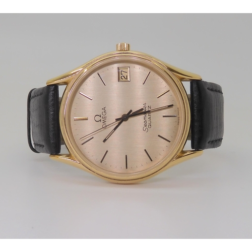 AN OMEGA SEAMASTER QUARTZwith a gold plated case gold coloured