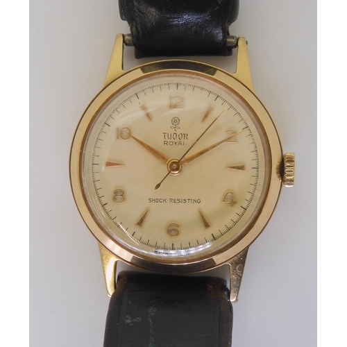 2877 - A 9CT GOLD TUDOR ROYAL WATCHwith cream coloured dial with gold coloured Arabic and dagger numerals, ... 