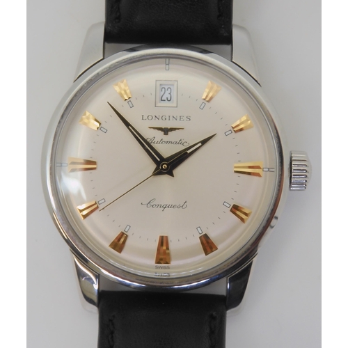 2879 - A LONGINES AUTOMATIC CONQUESTwith a silvered dial gold coloured dagger numerals and hands, with date... 