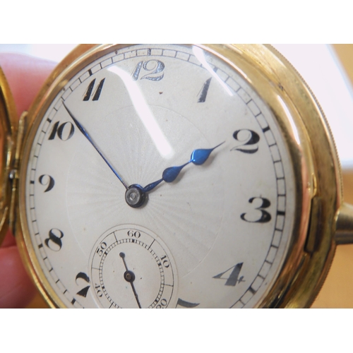 2885 - A SLIM HALF HUNTER POCKET WATCHthe case in 18ct gold, the front with black enamelled chapter ring, t... 