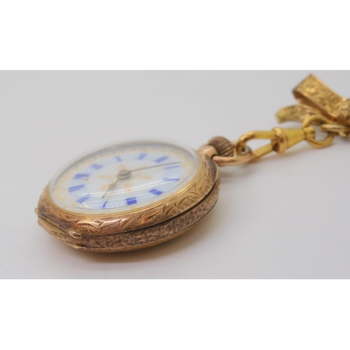 2888 - A 14K GOLD OPEN FACE FOB WATCHwith a decorative French gold transfer patterned dial & blue Roman... 