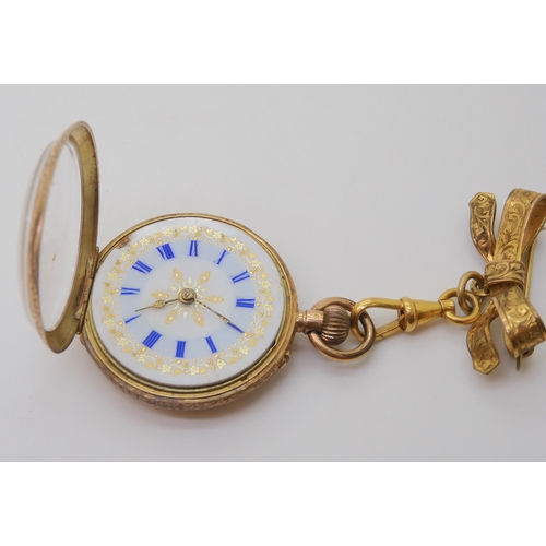 2888 - A 14K GOLD OPEN FACE FOB WATCHwith a decorative French gold transfer patterned dial & blue Roman... 