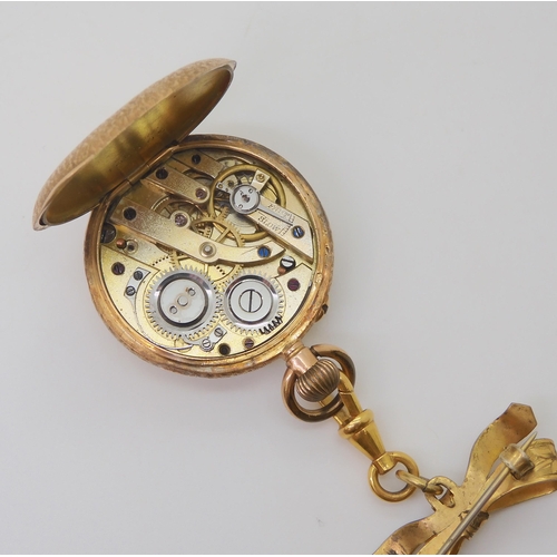 2888 - A 14K GOLD OPEN FACE FOB WATCHwith a decorative French gold transfer patterned dial & blue Roman... 