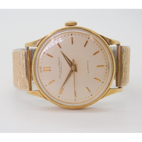 2890 - AN INTERNATIONAL WATCH CO AUTOMATIC WATCHwith a gold plated case, cream dial with gold coloured bato... 