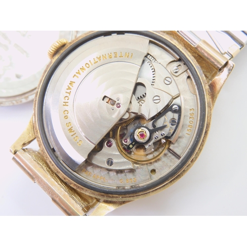 2890 - AN INTERNATIONAL WATCH CO AUTOMATIC WATCHwith a gold plated case, cream dial with gold coloured bato... 