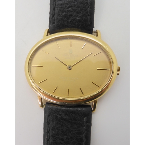 2895 - A UNIVERSAL GENEVE GOLDEN SHADOW with an automatic movement, the case in 18ct gold with Swiss hallma... 