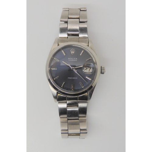 2909 - A ROLEX OYSTERDATE PRECISIONwith dark grey satined dial, silver coloured baton numerals, hands, and ... 