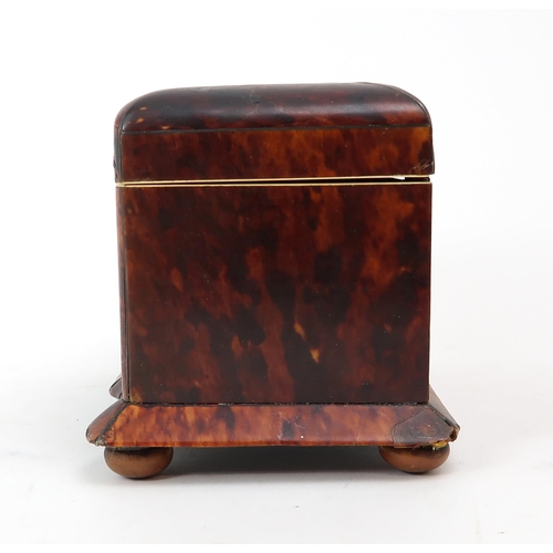 2554 - A 19th CENTURY TORTOISESHELL-VENEERED, MOTHER OF PEARL-INLAID AND IVORY-BANDED TEA CADDYWith domed t... 