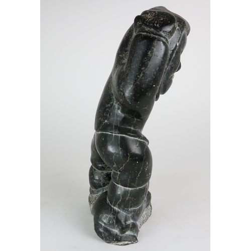 2950 - JOHNNY INUKPUK RCA (CANADIAN 1911-2007)INUK HOLDING ANIMAL Soapstone carving, inscribed indistinctly... 