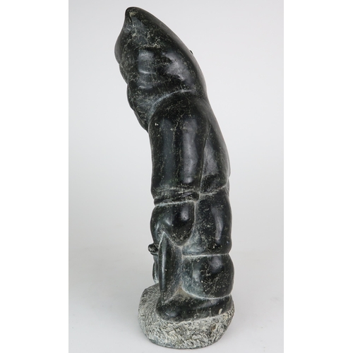 2950 - JOHNNY INUKPUK RCA (CANADIAN 1911-2007)INUK HOLDING ANIMAL Soapstone carving, inscribed indistinctly... 