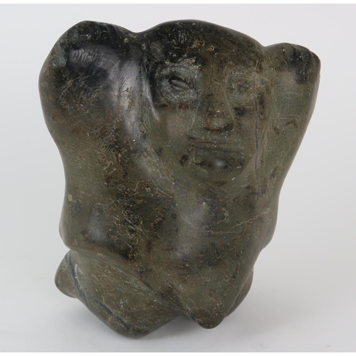 2952 - A 20TH CENTURY INUIT SOAPSTONE CARVING OF A FIGURE WITH HANDS ALOFT20.5cm high (8