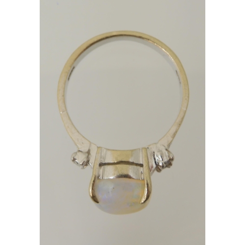 2797 - AN OPAL AND DIAMOND RINGmounted throughout in 18ct white gold, the oval opal is approx 11.3mm x 9.4m... 