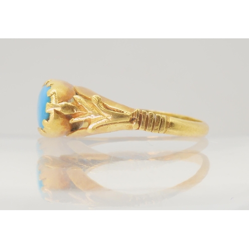 2800 - AN OF THE ANTIQUE RINGmade in bright yellow metal and set with a turquoise of approx 11mm x 6mm, fin... 