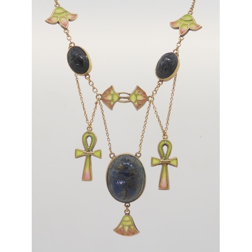 2802 - AN EGYPTIAN REVIVAL NECKLACEmade in gilded white metal, with plique a jour enamel ankhs and lotus fl... 