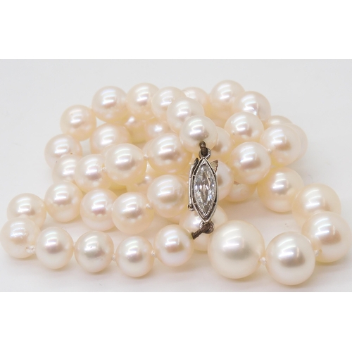 2760 - PEARLS WITH A MARQUIS DIAMOND CLASPthe pearls with a good lustre taper in size from 9mm to 6.6mm, th... 