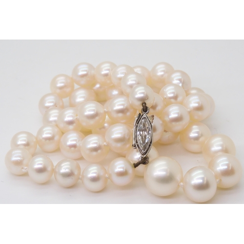 2760 - PEARLS WITH A MARQUIS DIAMOND CLASPthe pearls with a good lustre taper in size from 9mm to 6.6mm, th... 