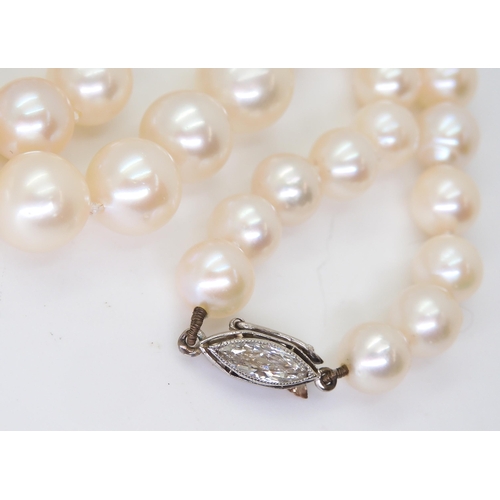 2760 - PEARLS WITH A MARQUIS DIAMOND CLASPthe pearls with a good lustre taper in size from 9mm to 6.6mm, th... 