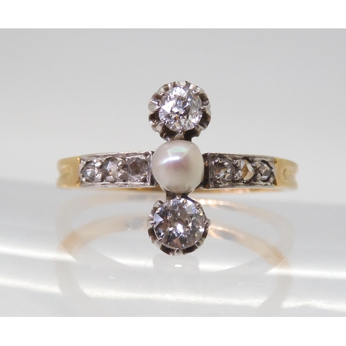 2770 - A VINTAGE DIAMOND & PEARL RINGthe twin diamonds are estimated approx 0.30cts combined, with furt... 